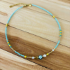 Collier fleur, perles d'eau douce et perles de rocaille - Bleu